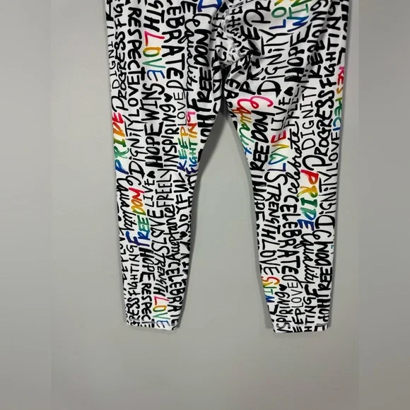 NWOT ATHLETA ELATION TRAIN 7/8
Tight Leggings PRIDE Graffiti words L - Picture 11 of 13